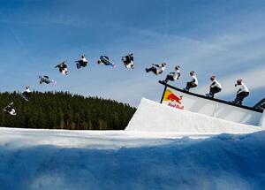 Snowboarder's First Triple Flip Off a Rail